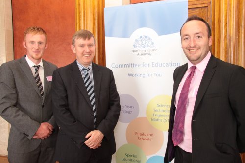 Chairperson of the Education Committee, Mervyn Storey MLA with guests at the Committee's Area Planning event