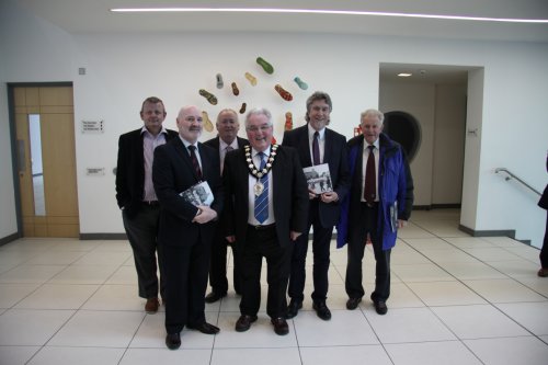 The Committee for Social Development pictured on a visit to Ballymena Town Hall where Members heard from Ballymena Borough Council Officials including the Lord Mayor P J McAvoy on the Council's work on Town Centre Regeneration. Pictured L-R are Committee Member Michael Copeland MLA, Committee Chairperson Alex Maskey MLA, Committee Member Fra McCann MLA, Ballymena Lord Mayor PJ McAvoy, Committee Deputy Chairperson Micky Brady MLA and Cllr Maurice Mills, Chair of the Economic Growth & Development Committee, Ballymena Borough Council.