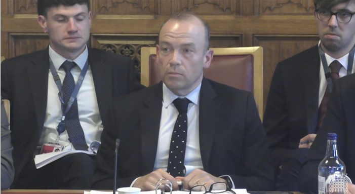 Secretary of State for Northern Ireland Chris Heaton-Harris giving evidence to the committee