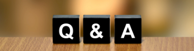 Black cubes with the letter Q and symbol and letter A
