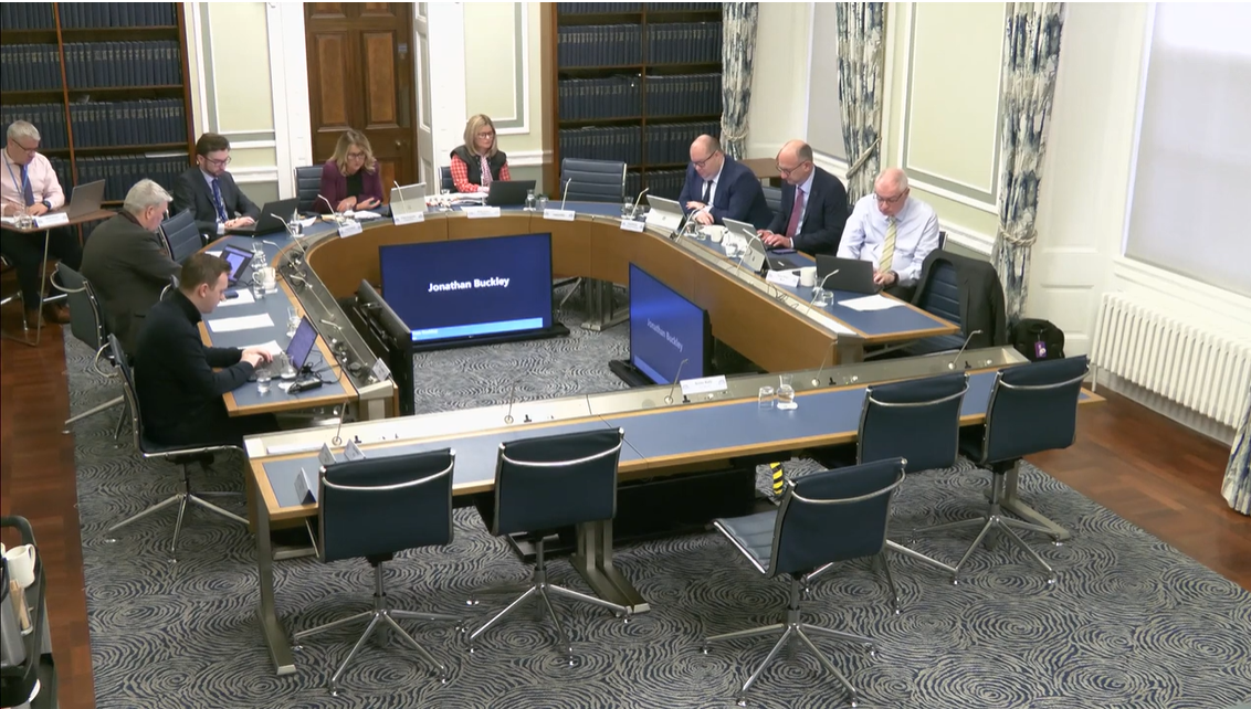 the Windsor Framework Democratic Scrutiny Committee (DSC) pictured in a committee room in parliament buildings