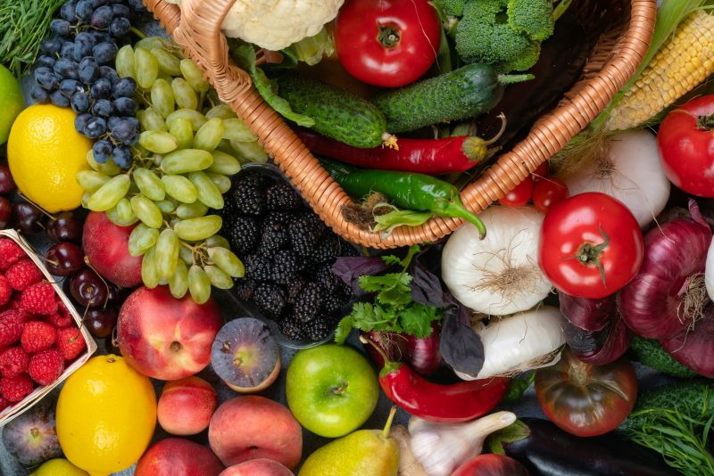 image shows a selection of fruit and vegetables.