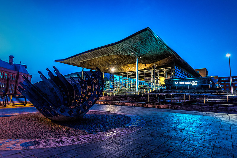 image is the front of the Welsh Assembly building taken at night
