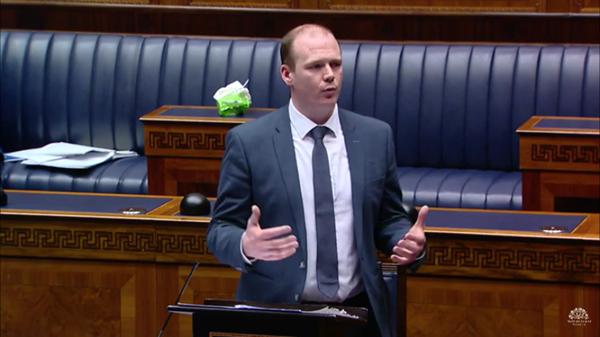 Minister Lyons speaking in the Northern Ireland Assembly on Monday | Source: NI Assembly