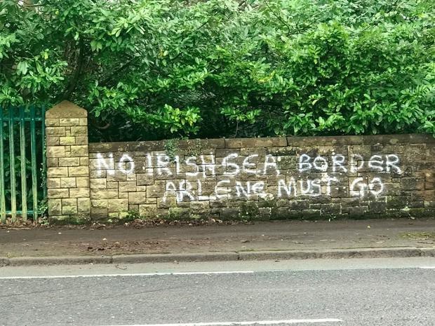 Hitting back: Graffiti in east Belfast. The graffiti says 'No Irish sea border. Arlene must go'.