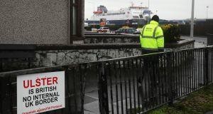 An anti-Brexit sign near the entrance to Larne Port. Photograph: Brian Lawless/PA Wire. The sign says 'Ulster is British - No internal UK boeder'