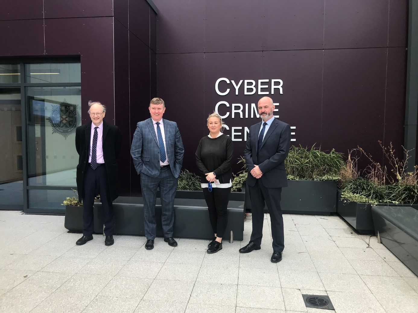 Justice Committee Members pictured outside of the PSNI Cybercrime Centre.