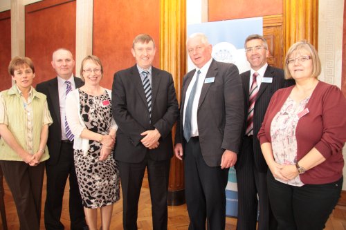 Chairperson of the Education Committee, Mervyn Storey MLA with guests at the Committee's Area Planning event