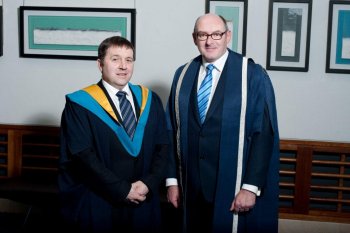Chairperson of the Employment and Learning Committee, Robin Swann MLA with John D'Arcy, Director of the Open University at the Open University's Graduation in Belfast on 11 May 2013