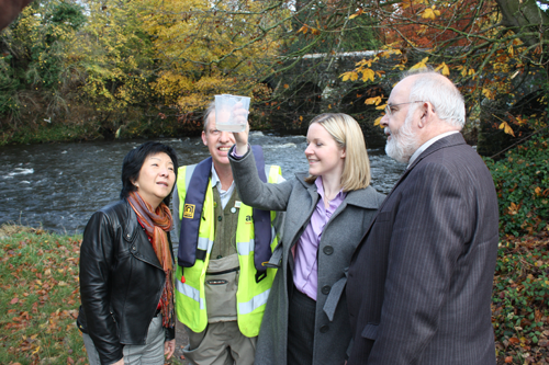 Committee members meet with representatives of the Northern Ireland Freshwater Taskforce to observe water quality at the Six Mile Water River in Antrim 