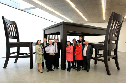 The Assembly Committee for Social Development visited the Cathedral Quarter today (Thursday 3rd) where they were given a tour of the new Belfast MAC and a walking tour of the area. Pictured at the Four Chairs and a Table exhibition are Members of the Committee.