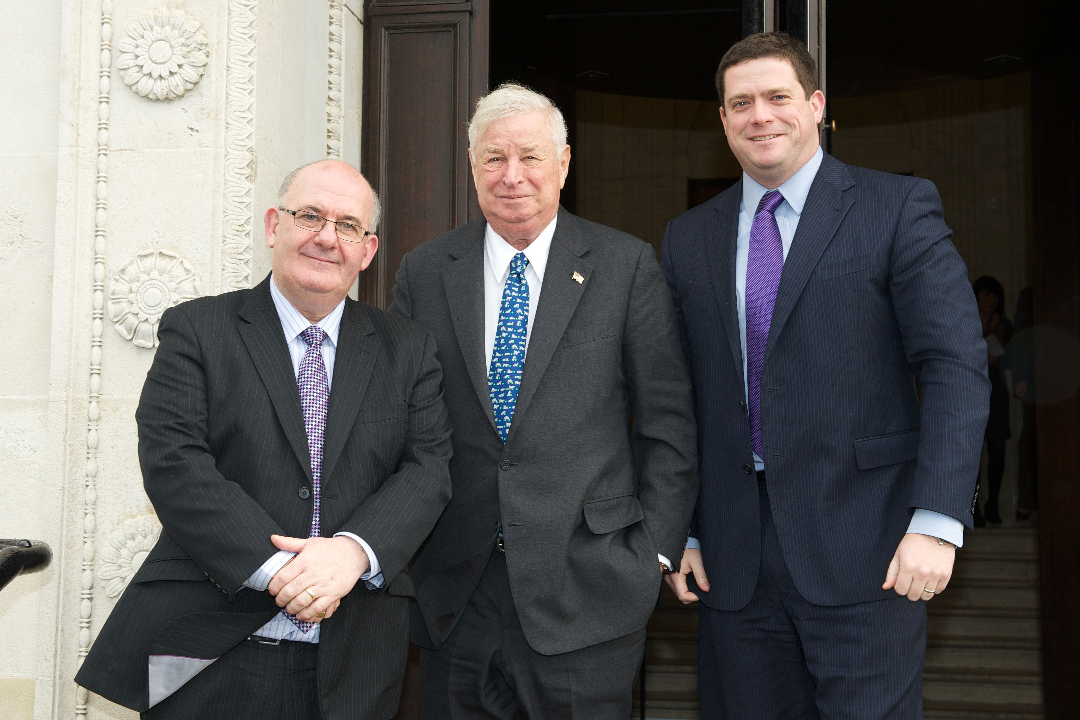 US Ambassador Louis Susman and US Consul Kevin Roland being welcomed to Parliament Buildings by The Speaker William Hay MLA