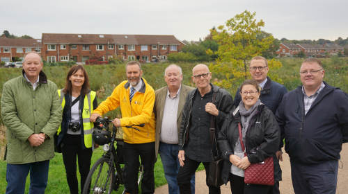 Pictured from left to right : Mr William Humphrey MLA (Chairperson), Mrs Wendy Langham (Connswater Community Greenway), Mr Andrew Grieve (Department for Infrastructure), Mr Fra McCann MLA, Mr Eamonn McCann MLA, Mrs Kellie Armstrong MLA, Mr Owen McGivern (Rivers Agency) and Mr Declan McAleer MLA.