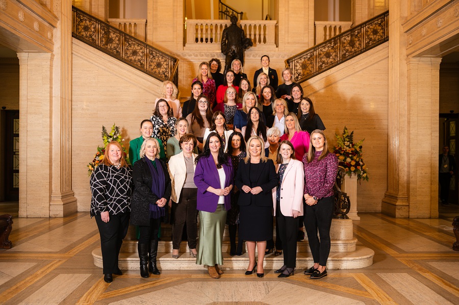 Every female MLA (from the 2022 - 2027 mandate) poses on the steps of the Great Hall in Parliament Buildings with Lesley Hogg, the Clerk/Chief Executive of the Assembly.