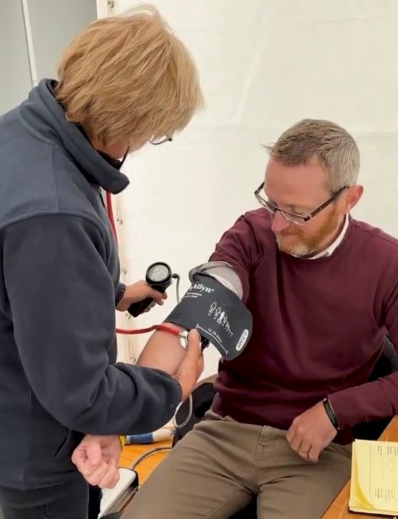 Pictured: Philip McGuigan MLA receiving his health check Pictured: Philip McGuigan MLA receiving his health check