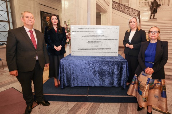 Memorial to victims and survivors of historical institutional abuse unveiled in Parliament Buildings Assembly Speaker Edwin Poots MLA, First Minister Michelle O’Neill MLA, deputy First Minister Emma Little-Pengelly MLA and Fiona Ryan, Commissioner for Survivors of Institutional Childhood Abuse, at the memorial to victims and survivors of historical institutional abuse which was unveiled in the Great Hall, Parliament Buildings.