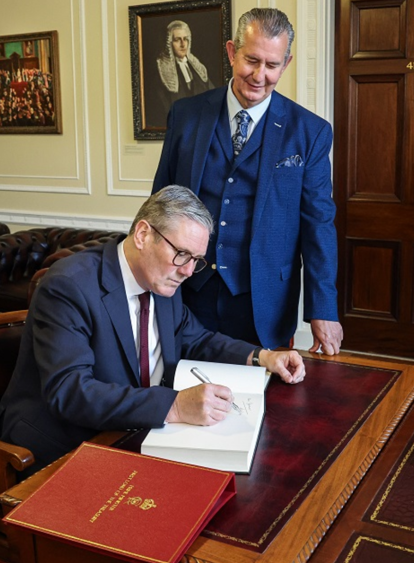     The Speaker welcomed the Prime Minister to the Speaker’s Office where he signed the visitors' book.