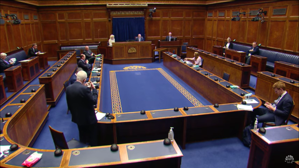 Stewart Dickson making his statement to the Assembly