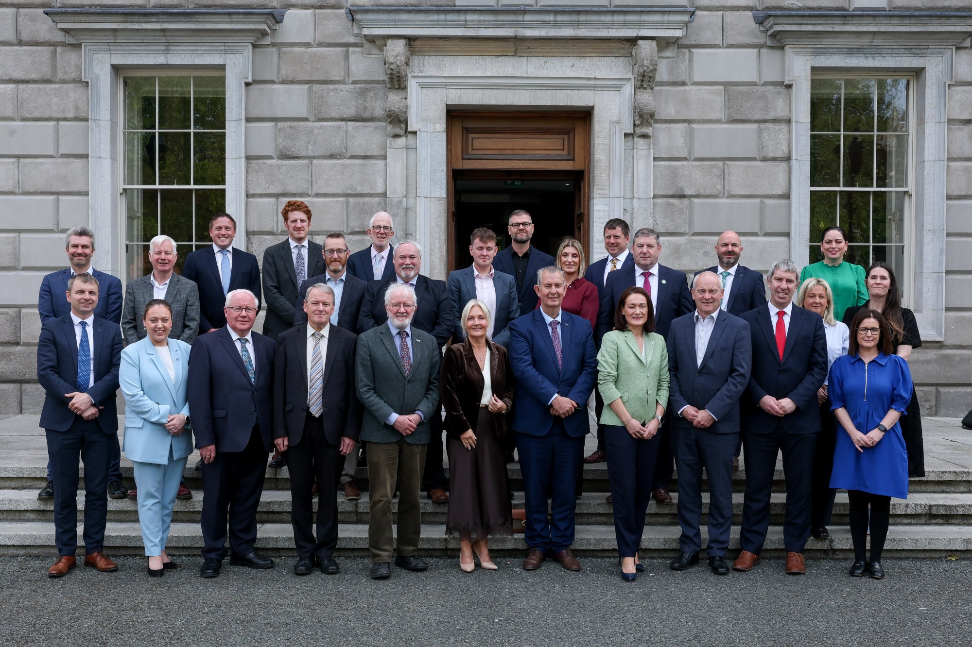 Members-of-NSIPA-standing-on-the-steps-in-front-of-Leinster-House-at-a-meeting-of-22-May-2026