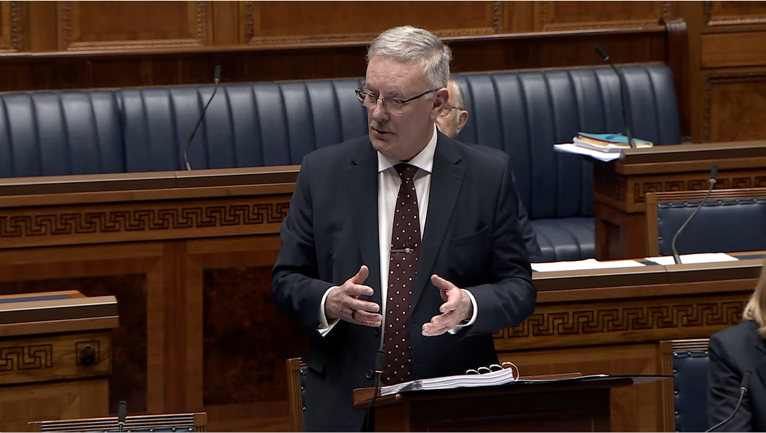 image shows the Heath Minister responding to a debate on ADHD Services