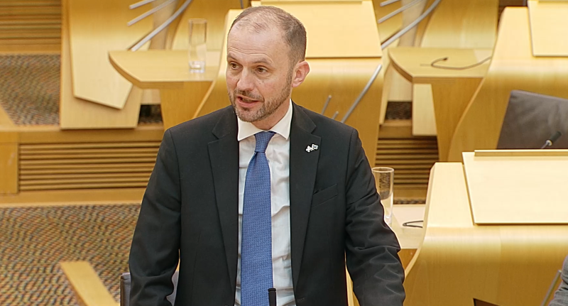 Image shows the or Europe, External Affairs and Energy, Stephen Gethins MSP pictured speaking during a debate in the Scottish Parliament.