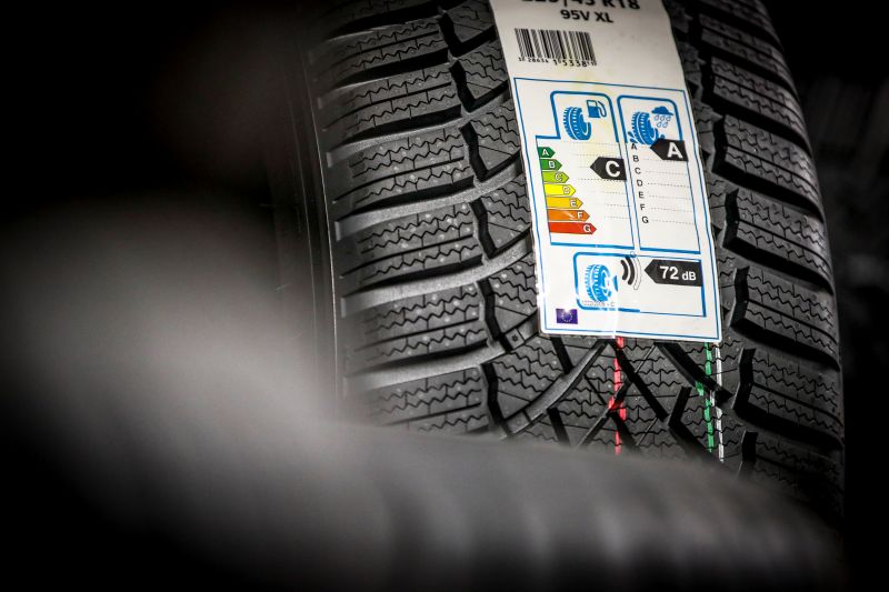 image shows a close up of a tyre with an energy efficiency label attached