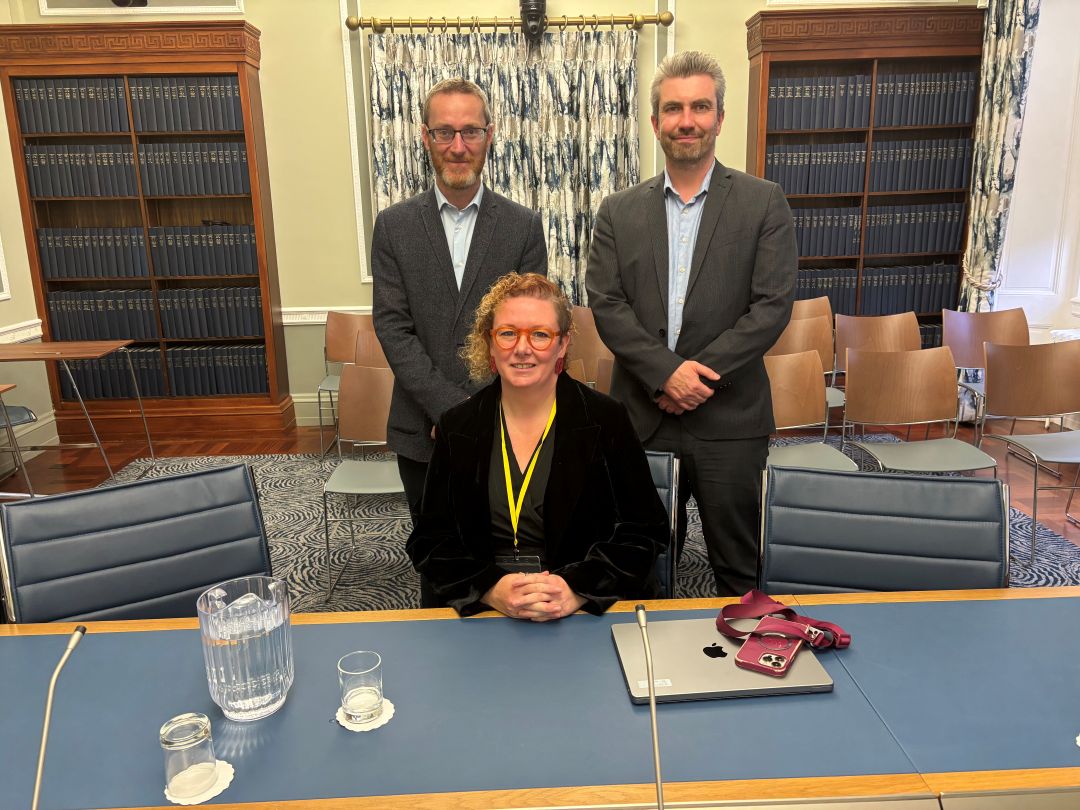 Seated is Emma Campbell of Alliance for Choice, standing behind her are Members of the Committee for Health