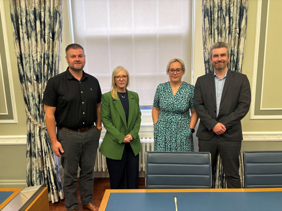 Standing in the Committee meeting room are representatives from Mental Health Policy Alliance with Members of the Committee for Health