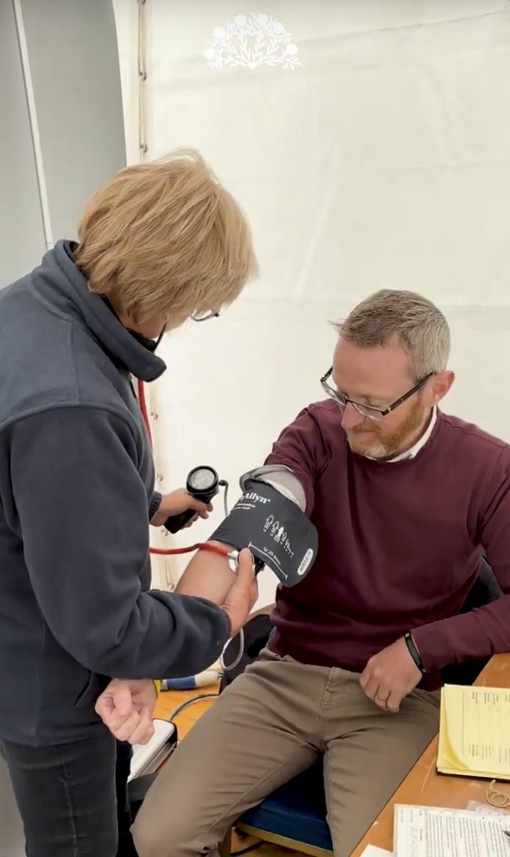 Pictured: Philip McGuigan MLA receiving his health check