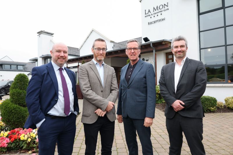 Outside La Mon Hotel is Mabon ap Gwnfor, MS Wales, with Philip McGuigan MLA, Rt Hon Alan Milburn and Danny Donnelly MLA