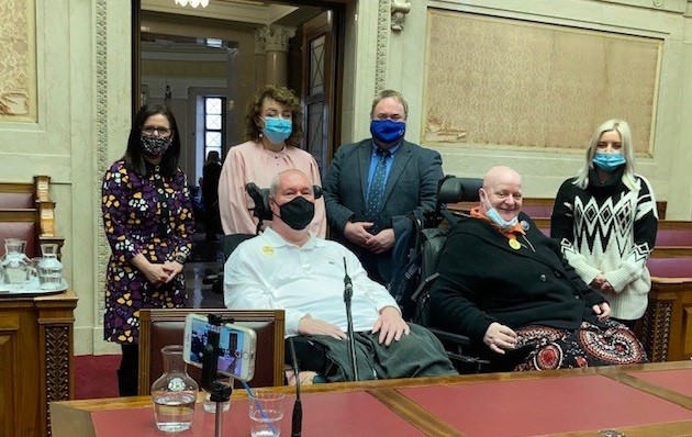 Paula Bradshaw MLA, Caral Ni Chuilín MLA and Colin Gildernew MLA pictured with delegates from the Disabled People’s Parliament in teh Assembly Chamber. 