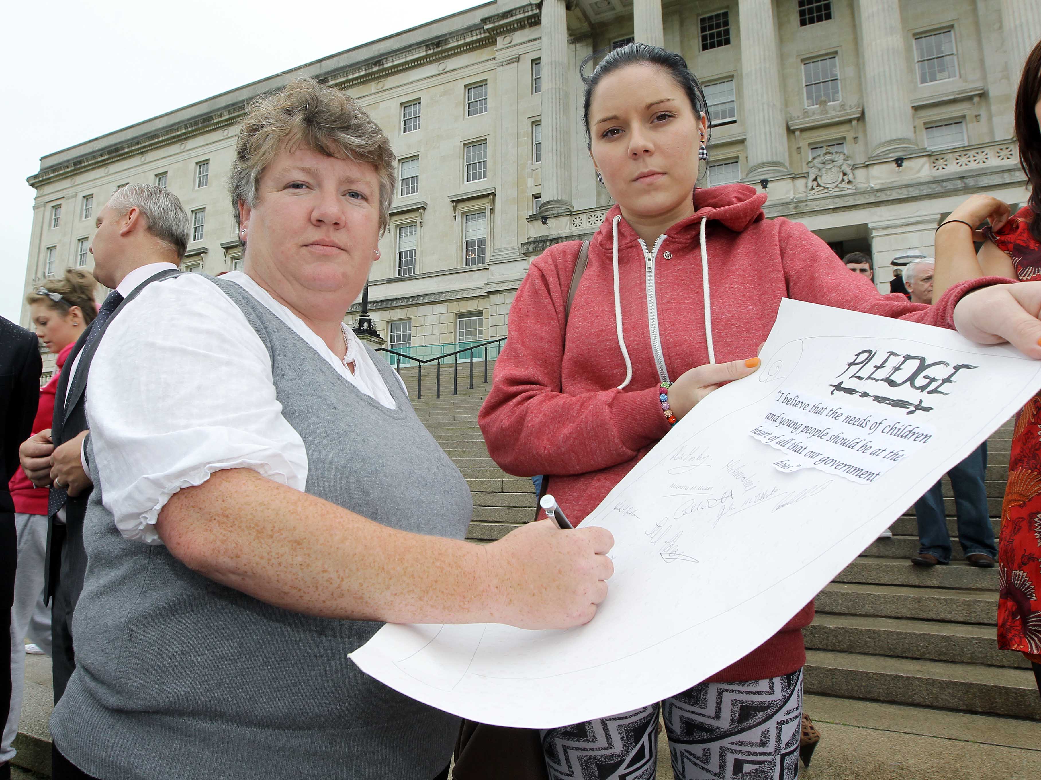 The Chairperson of the Northern Ireland Assembly Health Committee Sue Ramsey MLA signs a pledge stating that the needs of children and young people should be at the heart of all that government does. The signing of the pledge followed a Health Committee led event where 80 young people met with MLAs and Ministers to mark World Suicide Prevention Day.    