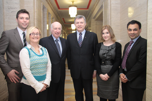 ETI Committee Chair Patsy McGlone and Robin Newton pictured with sector representatives on payday lending 