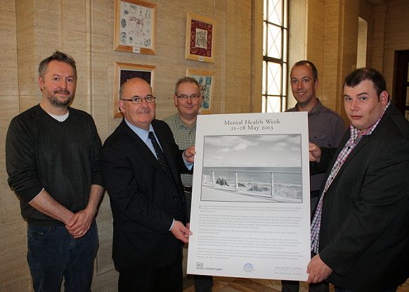 Representatives from Action Mental Health and Seacourt Print Workshop with the Speaker of the Northern Ireland Assembly, Mr William Hay MLA, at the launch of an exhibition to mark Mental Health Week.