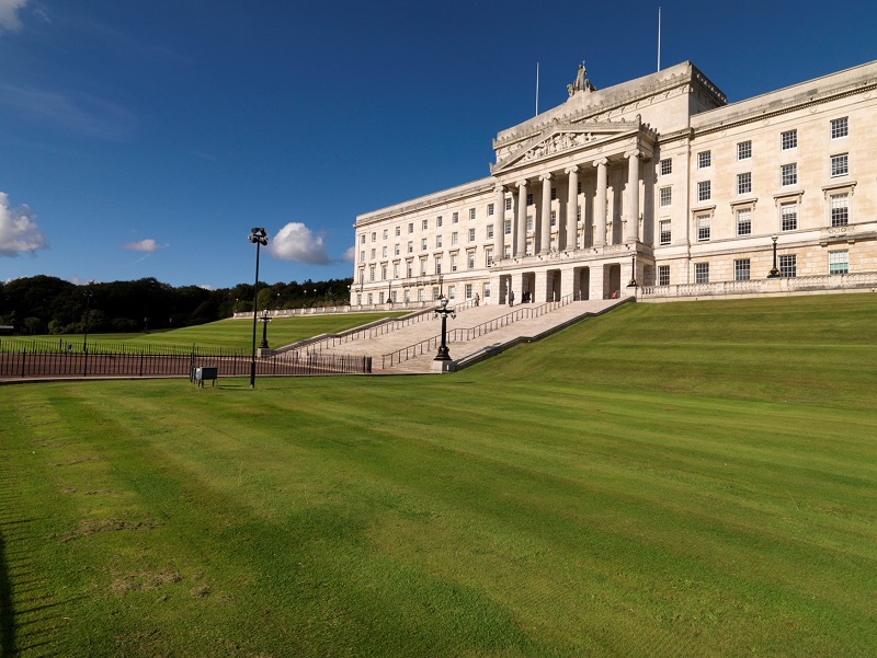 The front of Parliament Buildings on a bright sunny day.
