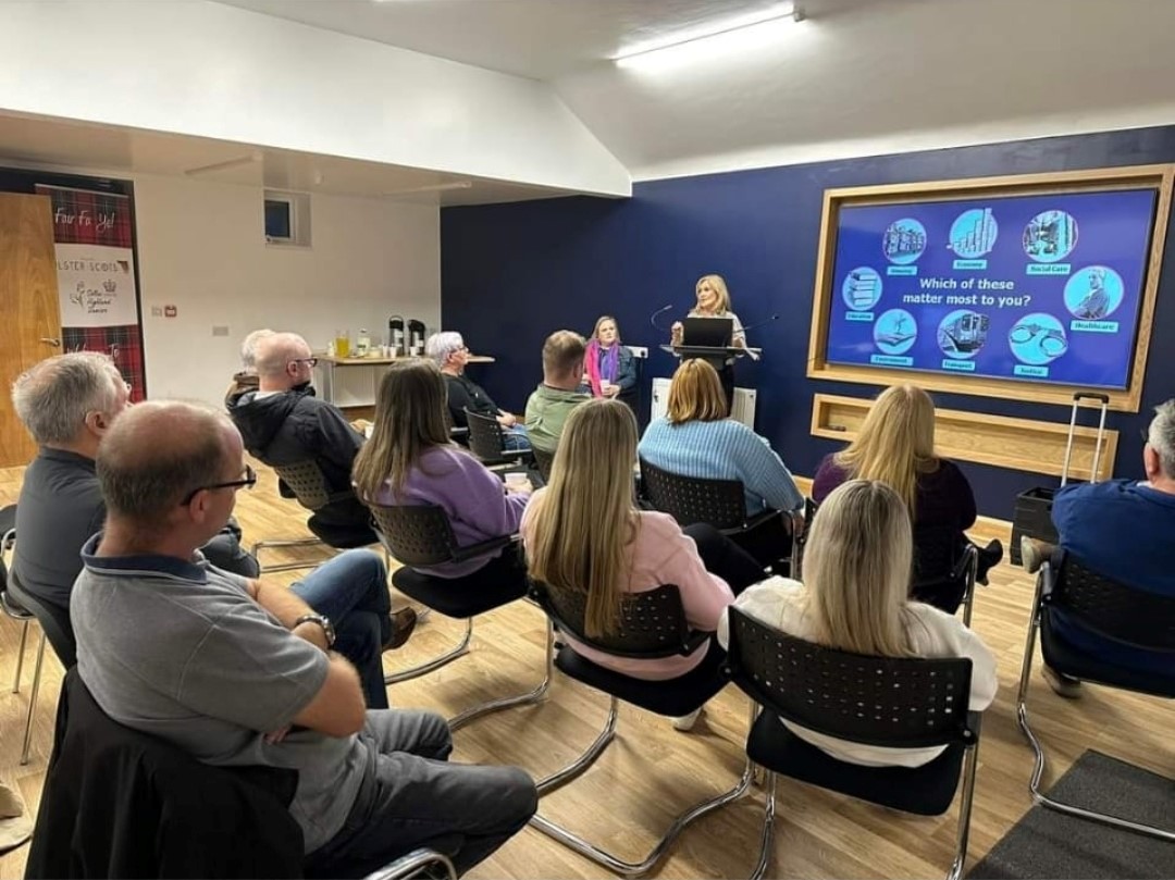 A workshop taking place with participants in a room within Parliament Buildings