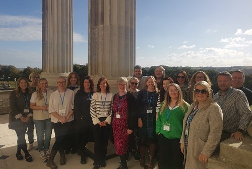Assembly explained workshop participants standing outside Parliament Buildings